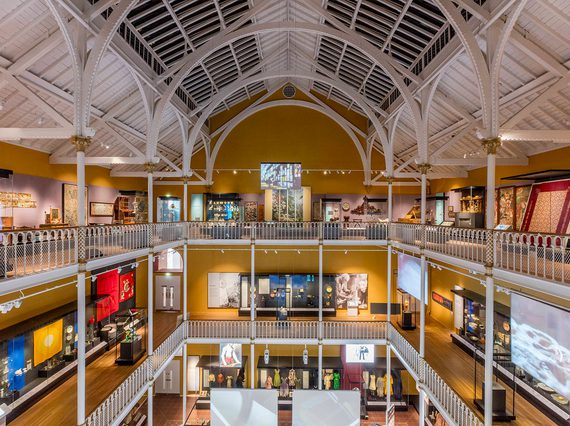A top-down view of the museum gallery, spanning three floors, showcasing a variety of artefacts on display.