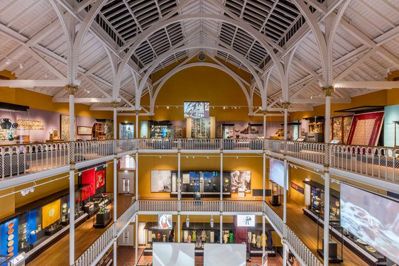 A top-down view of the museum gallery, spanning three floors, showcasing a variety of artefacts on display.