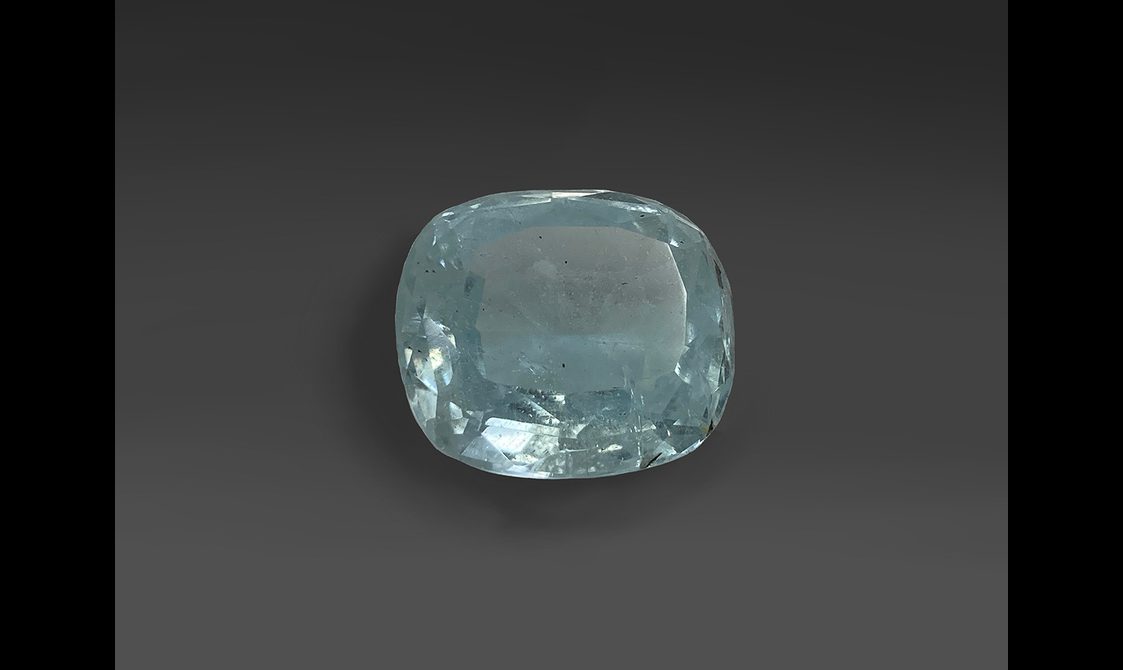 A large blue clear faceted gem