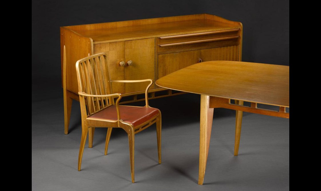 Wooden dining set with a wooden chair, table, and cabinet.