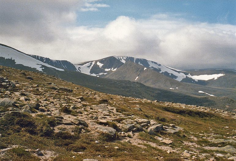 Snowy topped mountain and a hill