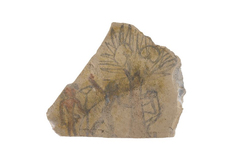 A chunk of limestone rock. Black and red ink scene of two boys chasing a monkey up a palm tree