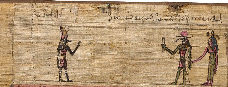 A fragment of an ancient Egyptian papyrus with an illustration of three figures and hieroglyph text.