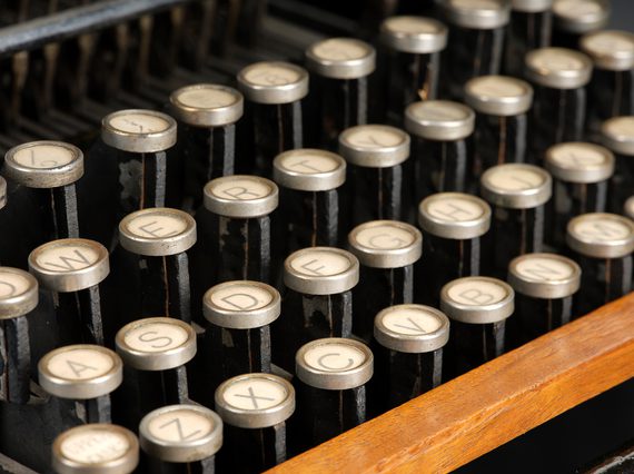 Close up of cream and black typewriter keys