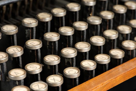 Close up of cream and black typewriter keys