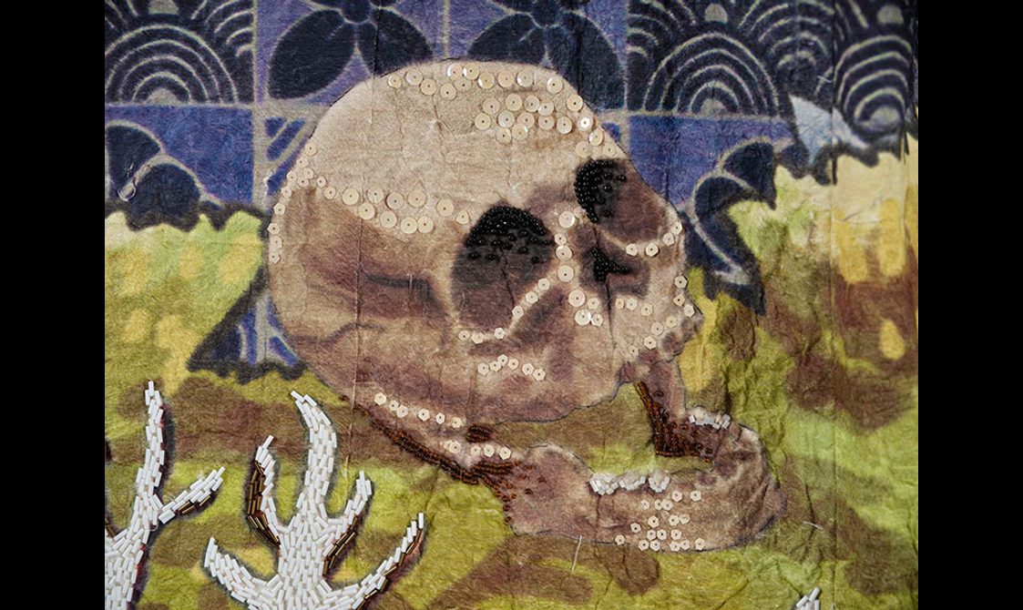 Kimono detail showing skull and bleached coral.
