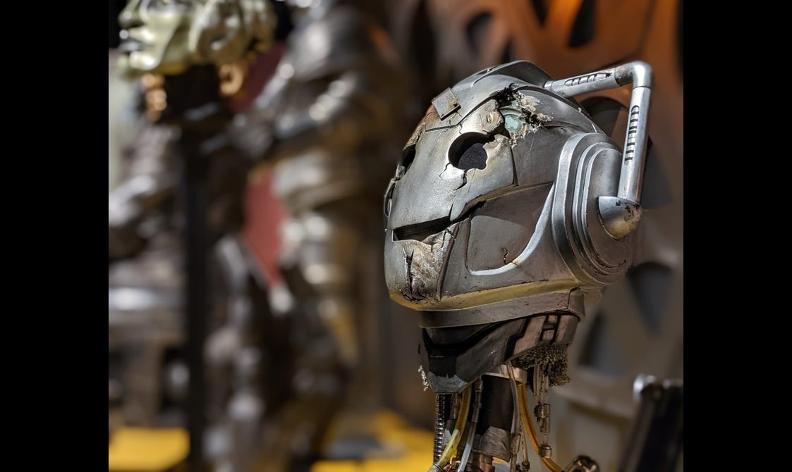 Close up of a silver robot head from Doctor Who.