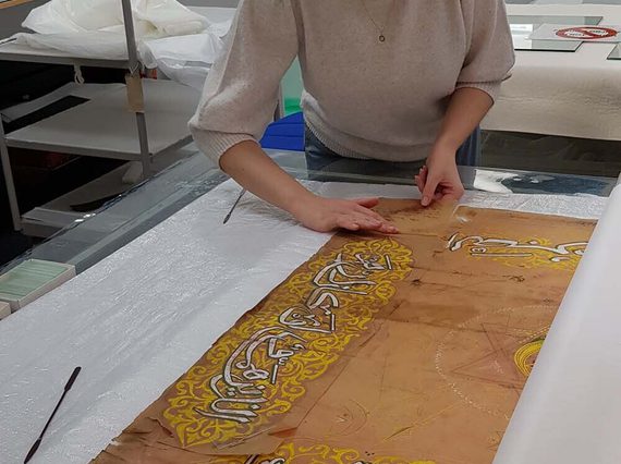 Emily Smoothing Out Tracing Paper During Humidification