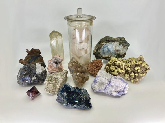 A group shot of different minerals on a table