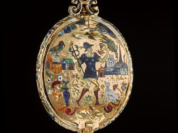 Golden, egg-shaped jewel against a black background. Decorated with a person in blue with a staff in an abstract, multi-coloured village.