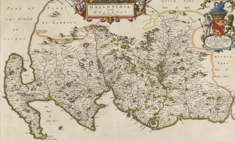 An yellowing old map of Gallovidia in Scotland with a royal crest in the top right corner.