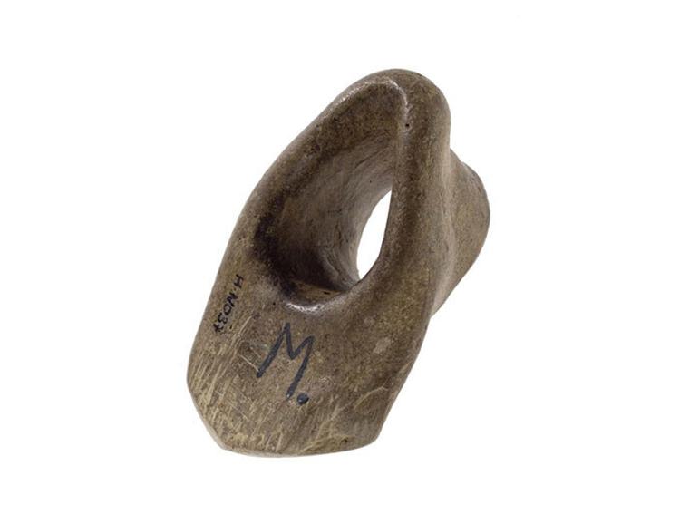 A piece of foot shaped flint with the centre eroded.