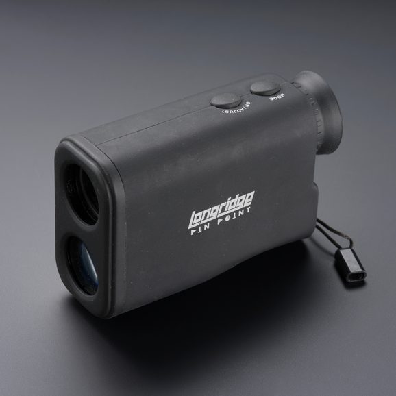 A black object that looks like a monocular.