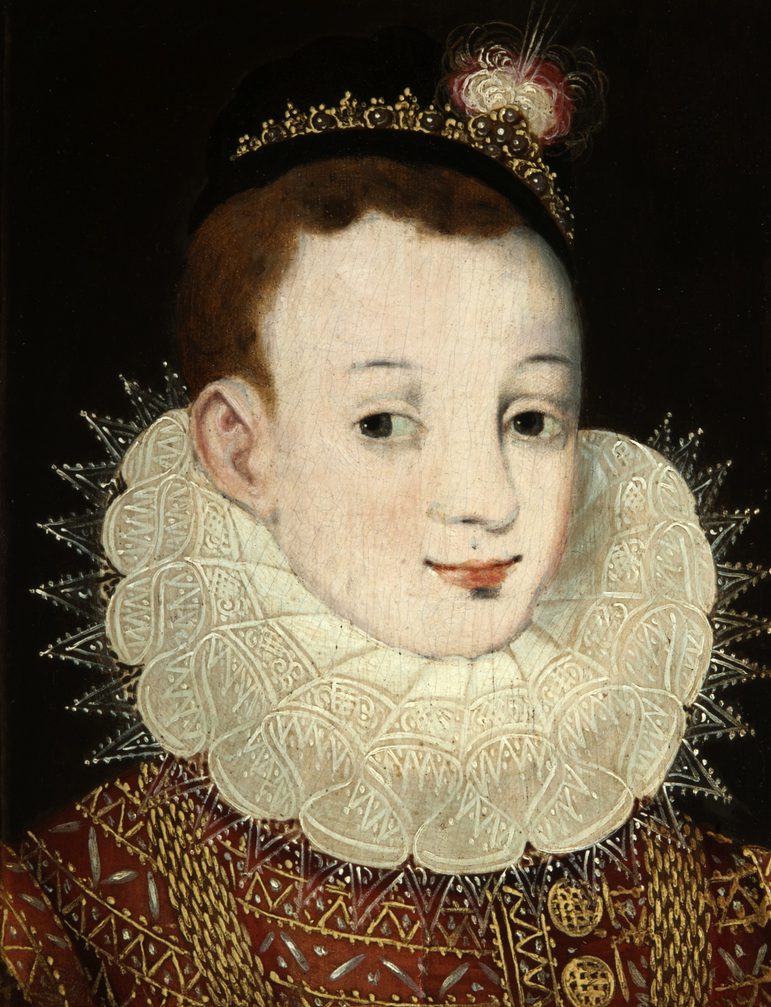 A painting of a young boy with short auburn hair wearing a black hat with a jewelled trim, and a ruffled lace white collar around his neck