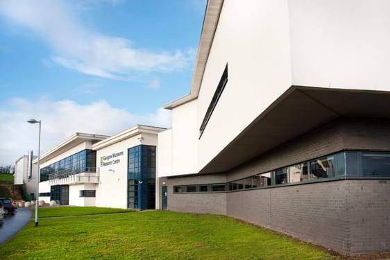 The exterior of a large white building, the Glasgow Museums Resource Centre