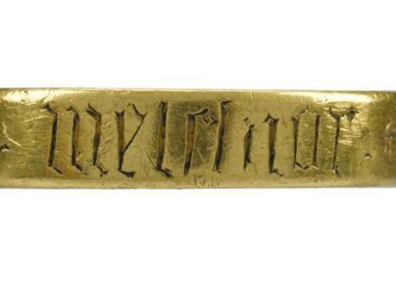 Three views of a gold ring with inscription reading CASPAR, MELCHIOR, BALTAZAR