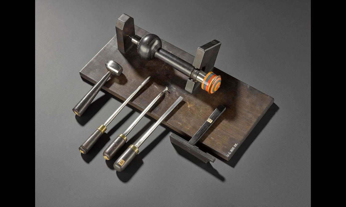 Model of a lathe with tools and a sample of a lacquered toy box