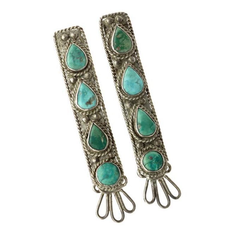 A pair of rectangular silver collar tips with turquoise stones