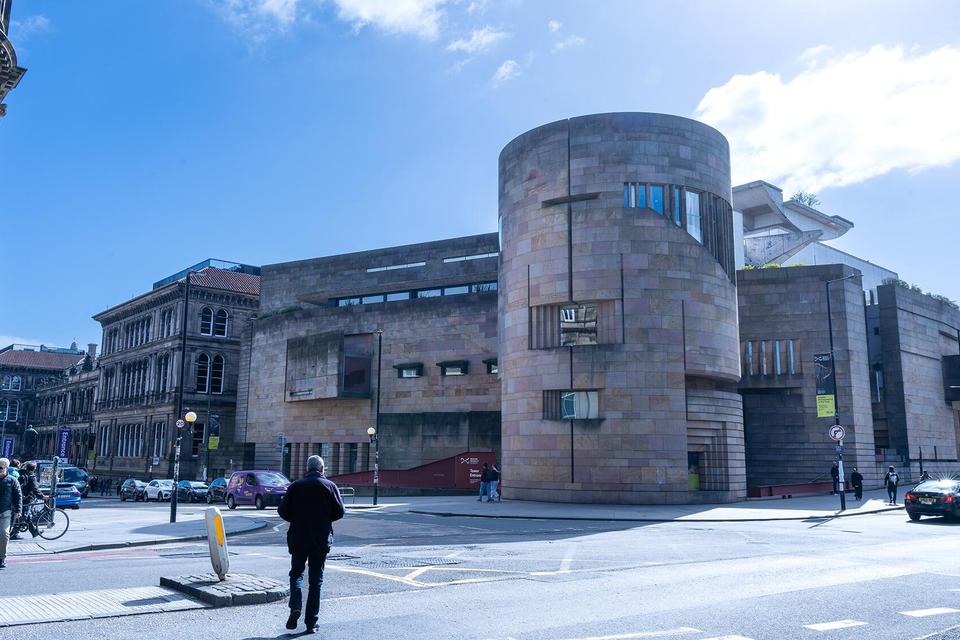 The exterior of a museum building with a mix of modern and Victorian architecture.