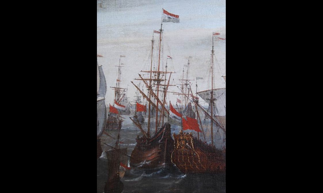 A battleship war at sea displaying wooden ships close to one another with red and white flags suspended off masts.