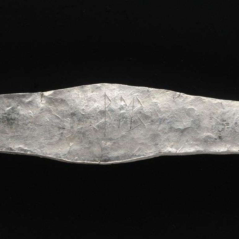 A close up of an inscription that reads BER.