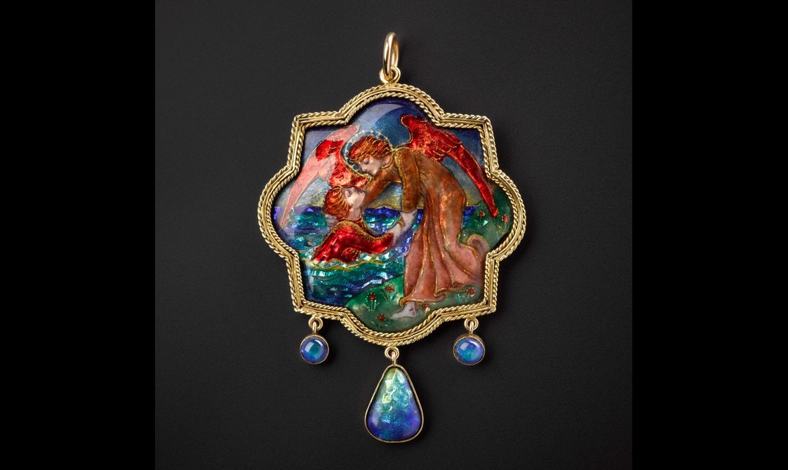A colourful enameled pendant depicting an angel holding a person in the sea. The pendant has a gold boarder and three blue stones dangling from the bottom.
