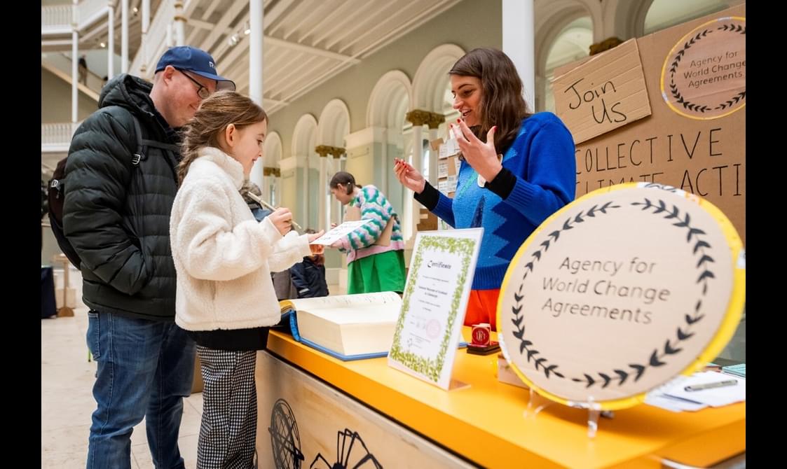 Two people are about to make their pledge at the agency for world change agreements.