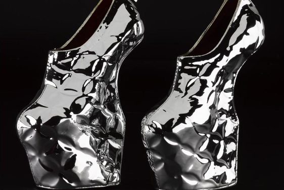 A pair of silver front-heeled shoes.
