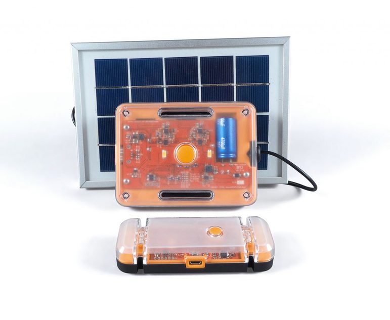 Two orange transparent boxes and a small white and blue solar battery panel set against a white background.