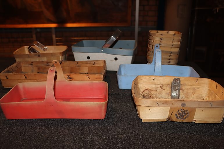 A selection of fruit punnets made from wood, card and plastic from the study store at the National Museum of Rural Life.