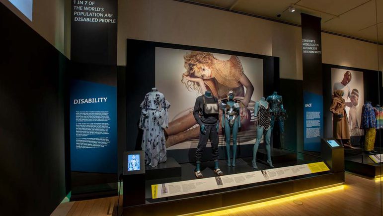 A display of mannequins in a museum.