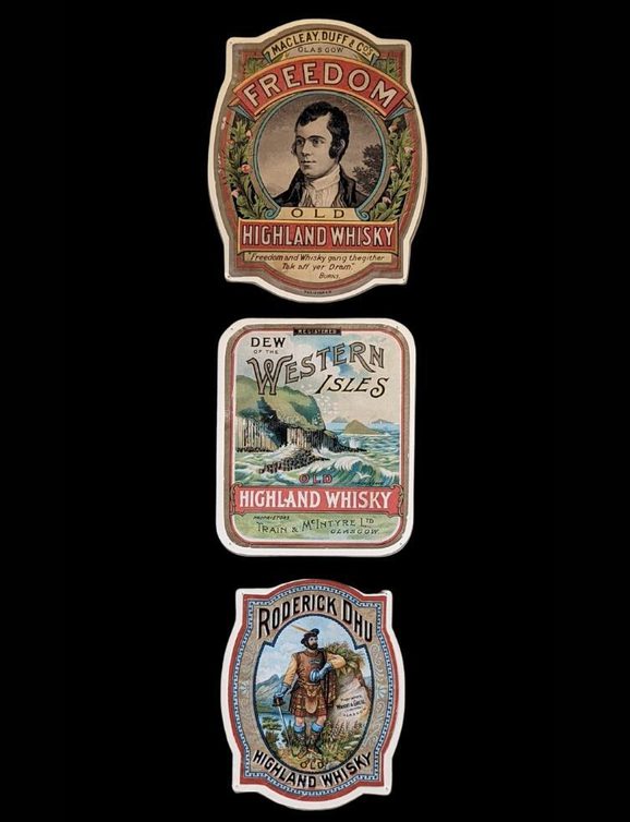 Three old whisky labels with colourful illustrations. One with a photo of Robert Burns, another with a sea and cliffs scene, and the third with a man in rugged highland dress with a sword.