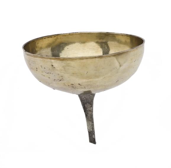 An undecorated silver-gilt bowl chalice with broken silver tang underneath.