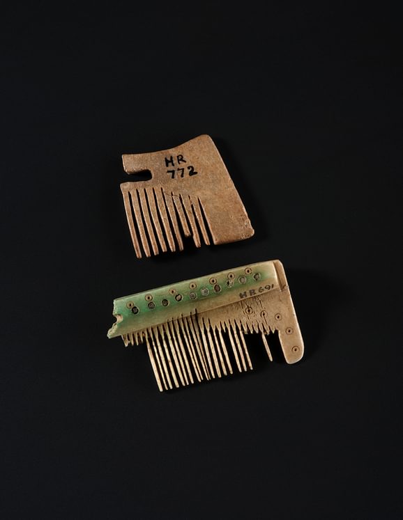 Two fragments of combs carved from bone