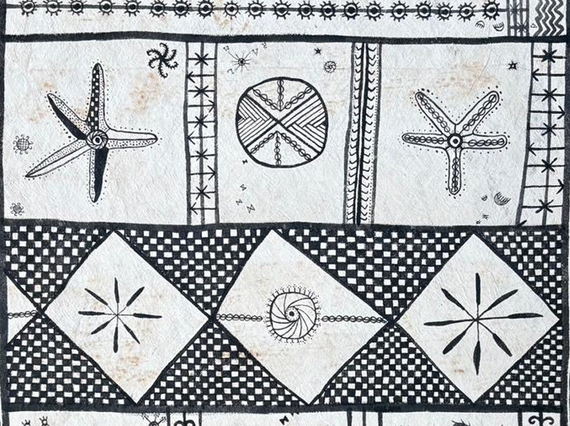 Close up of hiapo with naturalist and geometric designs.