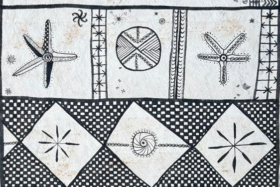 Close up of hiapo with naturalist and geometric designs.