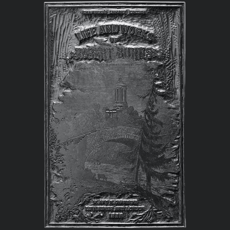 A wooden panel craved with a book cover of a title and a landscape scene. The panel is painted silver.
